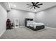 Bedroom featuring a ceiling fan and neutral carpeting at 1180 Antelope W Dr, Bennett, CO 80102