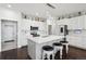 Well-lit kitchen featuring modern appliances and plenty of counter space at 1180 Antelope W Dr, Bennett, CO 80102