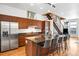 Modern kitchen with stainless steel appliances, granite countertops, and a kitchen island at 2706 Blake St, Denver, CO 80205