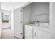 Convenient laundry room with full-size washer and dryer at 2706 Blake St, Denver, CO 80205