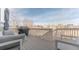 Relaxing deck offering views of the neighborhood with outdoor seating and a grill, great for outdoor entertaining at 973 Treece St, Louisville, CO 80027