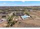 Aerial view of community pool and surrounding neighborhood at 27192 E Frost Pl, Aurora, CO 80016