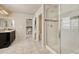 Modern bathroom with shower and access to bedroom at 27192 E Frost Pl, Aurora, CO 80016