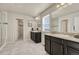 Elegant bathroom with double vanity and walk-in shower at 27192 E Frost Pl, Aurora, CO 80016