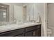 Bathroom with double vanity and bathtub at 27192 E Frost Pl, Aurora, CO 80016