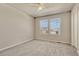 Well-lit bedroom with two windows and ceiling fan at 27192 E Frost Pl, Aurora, CO 80016