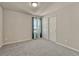 Bright bedroom with window and closet at 27192 E Frost Pl, Aurora, CO 80016