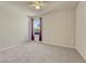 Cozy bedroom with window and ceiling fan at 27192 E Frost Pl, Aurora, CO 80016