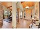 Elegant foyer with wood accents, tile flooring, and natural light at 2433 Dogie Spur, Golden, CO 80403