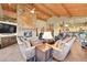 Spacious living room featuring a stone fireplace and an open floor plan at 2433 Dogie Spur, Golden, CO 80403