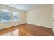 Bright bedroom with hardwood floors and two large windows at 444 S Kittredge St # 205, Aurora, CO 80017