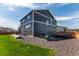 Backyard features a patio with furniture and a trampoline, great for outdoor enjoyment at 920 William Way, Brighton, CO 80603