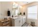Well-lit bathroom with double vanity, modern fixtures, and a clean, contemporary design at 920 William Way, Brighton, CO 80603