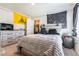 Inviting bedroom with unique decor, comfortable bedding, and a closet at 920 William Way, Brighton, CO 80603