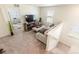 Cozy living room with plush seating, stylish decor, and abundant natural light, creating an inviting atmosphere at 920 William Way, Brighton, CO 80603