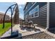 Patio with outdoor seating, features a table and chairs, perfect for outdoor entertaining at 920 William Way, Brighton, CO 80603