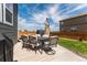Patio with outdoor seating, features a table and chairs, perfect for outdoor entertaining at 920 William Way, Brighton, CO 80603
