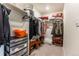 Organized walk-in closet with ample storage for clothing, shoes, and accessories at 920 William Way, Brighton, CO 80603