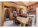 Charming kitchen features wood ceiling, cabinets, appliances and table at 91 Slalom Dr, Breckenridge, CO 80424