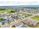 Extensive aerial view of the residential area with green spaces and well-placed homes, offering a serene community setting at 7218 Animas Ave, Frederick, CO 80530