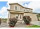 Inviting front porch with rocking chairs, welcome mat, and partially-glass front door at 7218 Animas Ave, Frederick, CO 80530