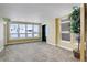 Well-lit lobby featuring a carpeted floor and large windows with snow covered scenery at 10184 Park Meadows Dr # 1406, Lone Tree, CO 80124