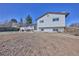 Wide backyard with a pergola and a large bare area at 1922 S Ivory Way, Aurora, CO 80013