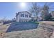 Split-level home with a large tree in the front yard at 1922 S Ivory Way, Aurora, CO 80013