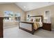 Spacious bedroom with vaulted ceiling and large windows offering plenty of natural light and neighborhood views at 6878 Northstar Ct, Castle Rock, CO 80108