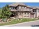 Charming home exterior with lush landscaping and well-maintained front yard at 6878 Northstar Ct, Castle Rock, CO 80108