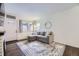 Comfortable living room featuring a cozy couch and bright windows at 1519 S Lowell Blvd, Denver, CO 80219