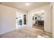 View of living room transitions into dining area and kitchen, offering an open floor plan at 1519 S Lowell Blvd, Denver, CO 80219