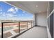 A balcony with steel cable railings offering a scenic neighborhood view at 1263 Rhett Dr, Erie, CO 80026