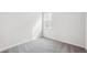 Bright bedroom with a window, neutral paint, and carpeted floors at 1263 Rhett Dr, Erie, CO 80026