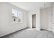 Bright bedroom with a closet, neutral paint, and carpeted floors at 1263 Rhett Dr, Erie, CO 80026