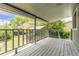 Relaxing back porch overlooking a lush green yard at 7046 W 62Nd Pl, Arvada, CO 80003