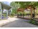 Spacious backyard featuring a covered deck, large patio and a raised porch at 7046 W 62Nd Pl, Arvada, CO 80003