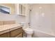 Clean bathroom featuring a shower/tub, a medicine cabinet, and tile flooring at 8100 W Quincy Ave # D, Littleton, CO 80123