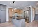 Modern kitchen with stainless steel appliances, light wood cabinetry and sleek countertops at 1819 N Grove St, Denver, CO 80204