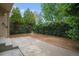 Inviting wood deck overlooks the lush, private backyard perfect for outdoor relaxing and entertaining at 7582 S Newport Ct, Centennial, CO 80112
