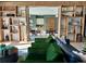 A cozy living space with ample natural light, featuring built-in shelves at 39733 Penn Rd, Elizabeth, CO 80107