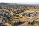 Panoramic aerial view of the community featuring a school and surrounding neighborhood at 10588 E Park Mtn, Littleton, CO 80127