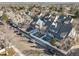 Overhead view of homes showcasing roof lines and private fenced-in backyards at 10588 E Park Mtn, Littleton, CO 80127