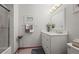 A refreshing bathroom featuring a shower-tub and a clean, white vanity at 10588 E Park Mtn, Littleton, CO 80127