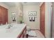 Functional bathroom featuring a classic vanity, toilet, and shower at 10588 E Park Mtn, Littleton, CO 80127
