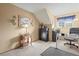 Bright bedroom featuring neutral walls, plush carpets, and dedicated desk space at 10588 E Park Mtn, Littleton, CO 80127