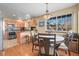 Inviting breakfast nook featuring a round table near the kitchen and large windows for ample light at 10588 E Park Mtn, Littleton, CO 80127