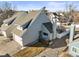 Inviting townhome with a well-maintained lawn and a cozy outdoor seating area at 10588 E Park Mtn, Littleton, CO 80127