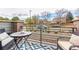 Private balcony seating area with views of the street and neighborhood at 5187 S Fairplay St, Aurora, CO 80015