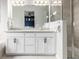 Bathroom with double vanity, granite countertop, shower and bedroom view at 5187 S Fairplay St, Aurora, CO 80015